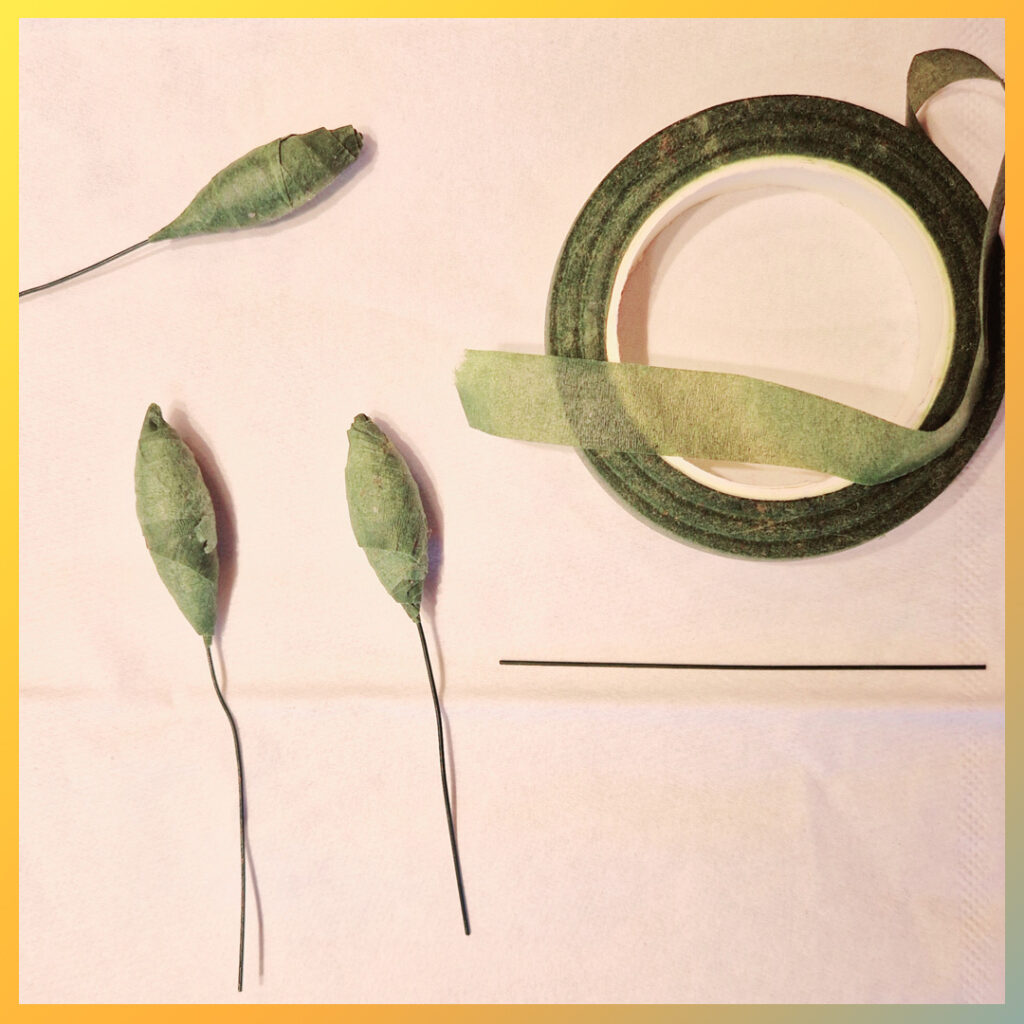 Bloemknopjes gemaakt van bloemendraad en floral tape.