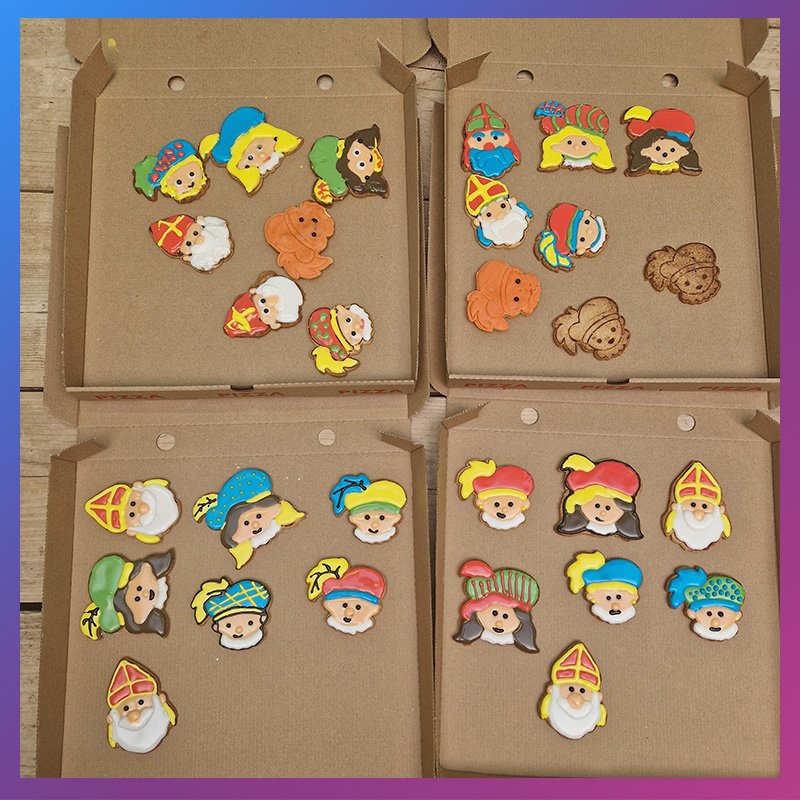 Zandkoekjes in thema sinterklaas die gedecoreerd zijn met royal icing tijdens een ouder-kind workshop van Wauw Workshops in Kasteel 4 in Woerden